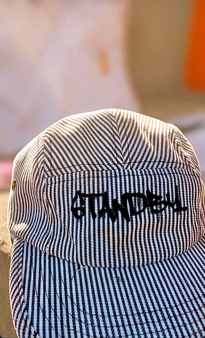 Striped panel cap